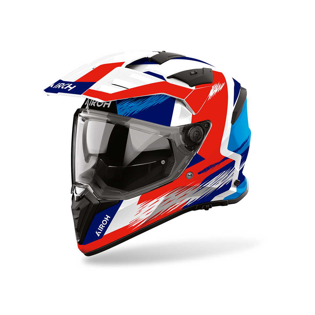Airoh Bandit BADX-X Airspeed Blu/Rosso Lucido (BATA29), casco adventure visto di tre quarti dal lato sinistro, grafica bianca, rossa e blu, lucida