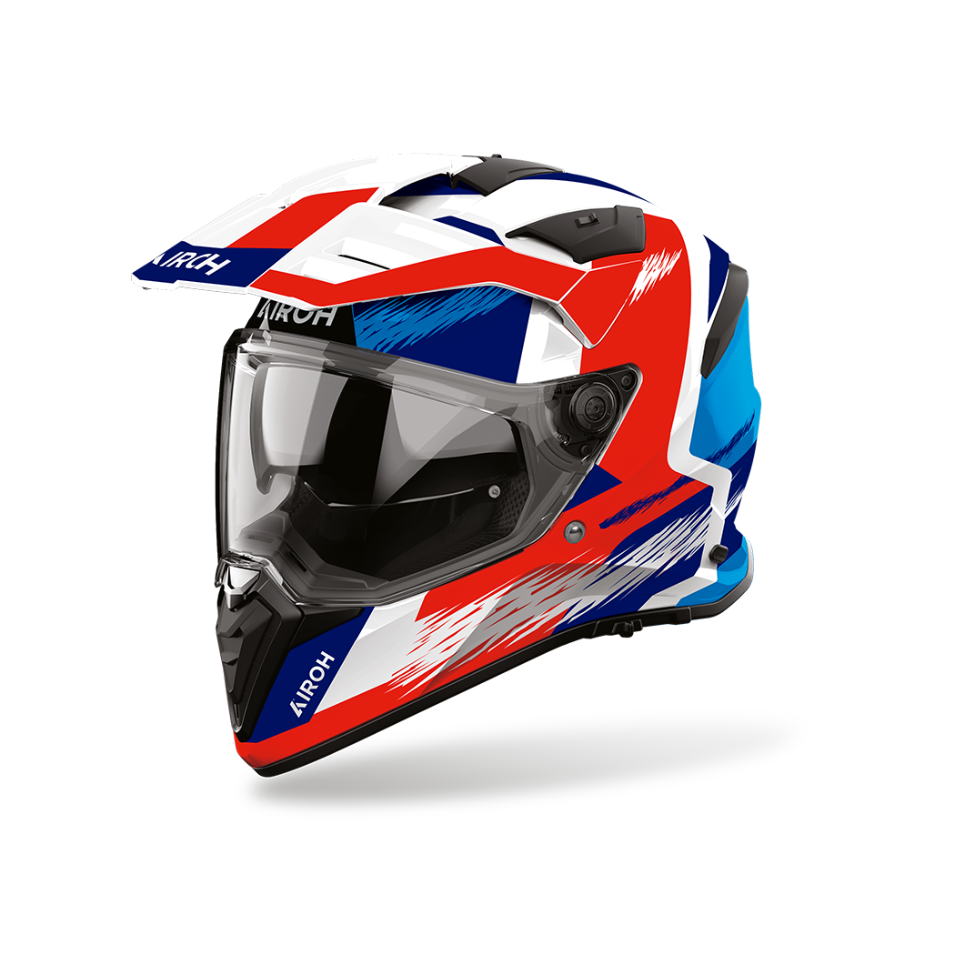 Airoh Bandit BADX-X Airspeed Blu/Rosso Lucido (BATA29), casco adventure visto di tre quarti dal lato sinistro, grafica bianca, rossa e blu, lucida