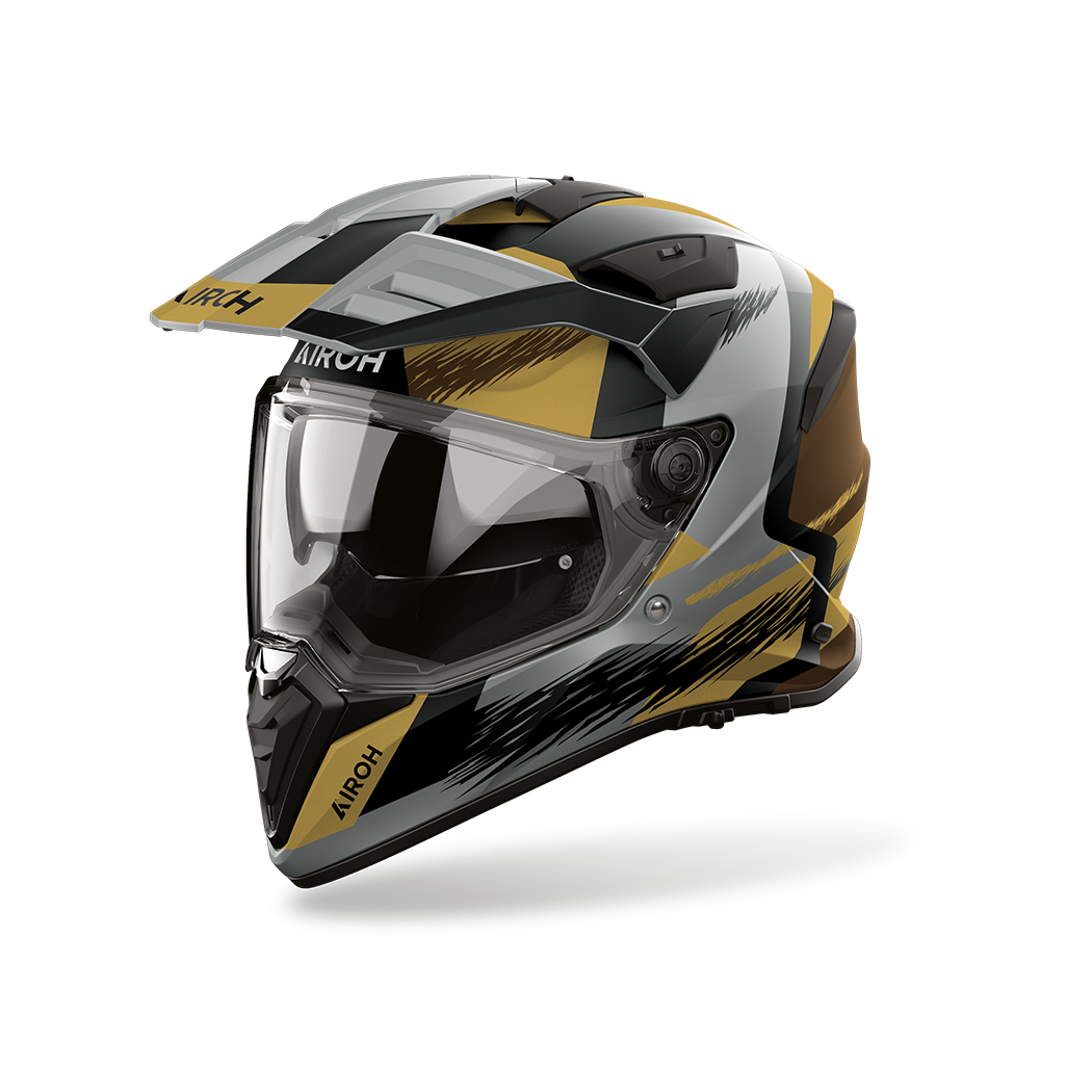 Airoh Bandit BADX-X Airspeed Sabbia Opaco (BATA35), casco adventure visto di tre quarti dal lato sinistro, grafica sabbia, grigia e nera, opaca