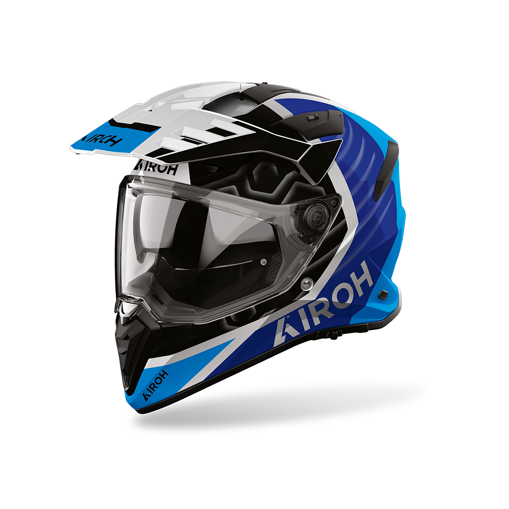 Airoh Bandit BADX-X Cube Blu Lucido (BATC18), casco adventure visto di tre quarti dal lato sinistro, grafica blu e azzurra con inserti bianchi, lucida