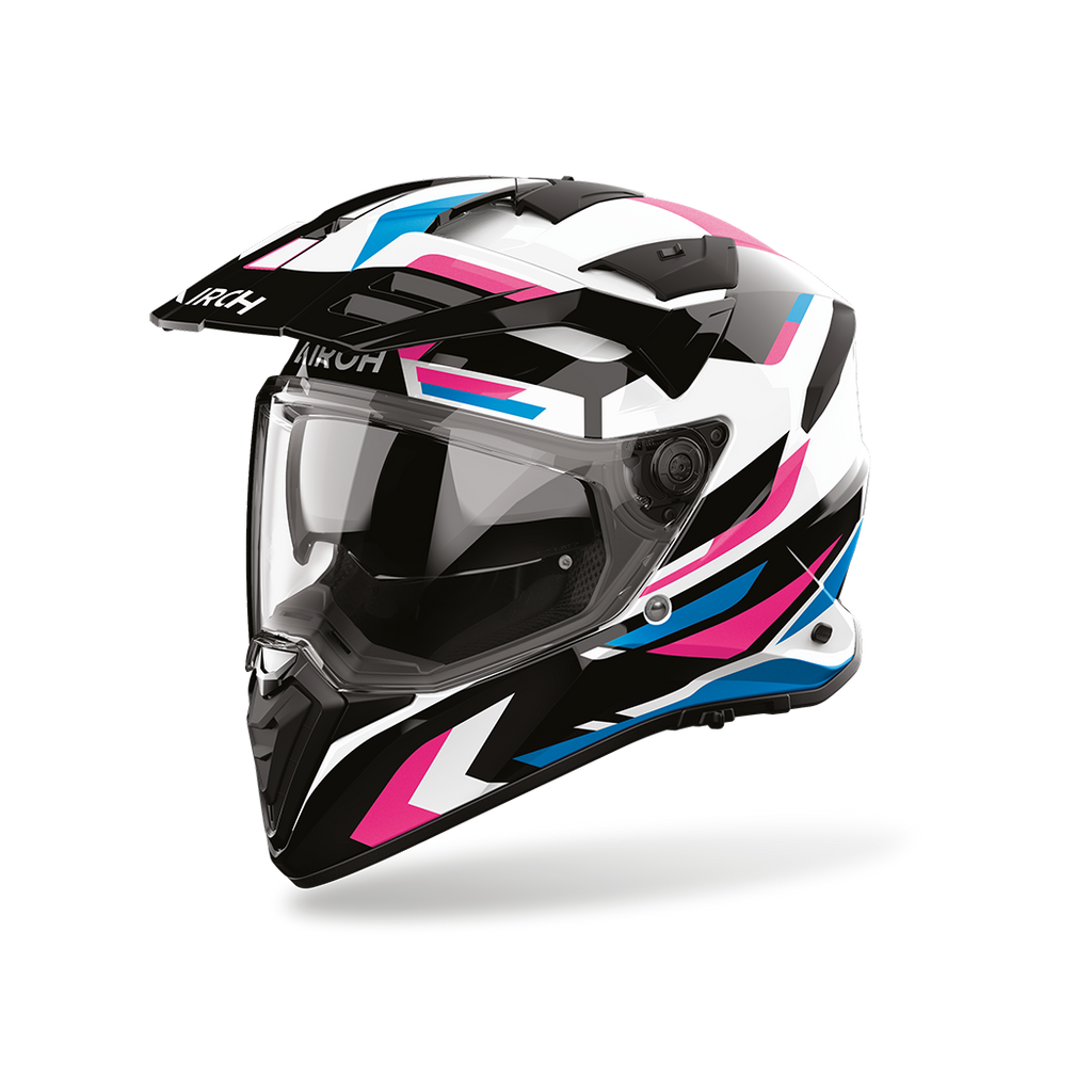 Airoh Bandit BADX-X Glitch Rosa Lucido (BATG54), casco adventure visto di tre quarti dal lato sinistro, grafica bianca e nera con inserti rosa e azzurri, lucida