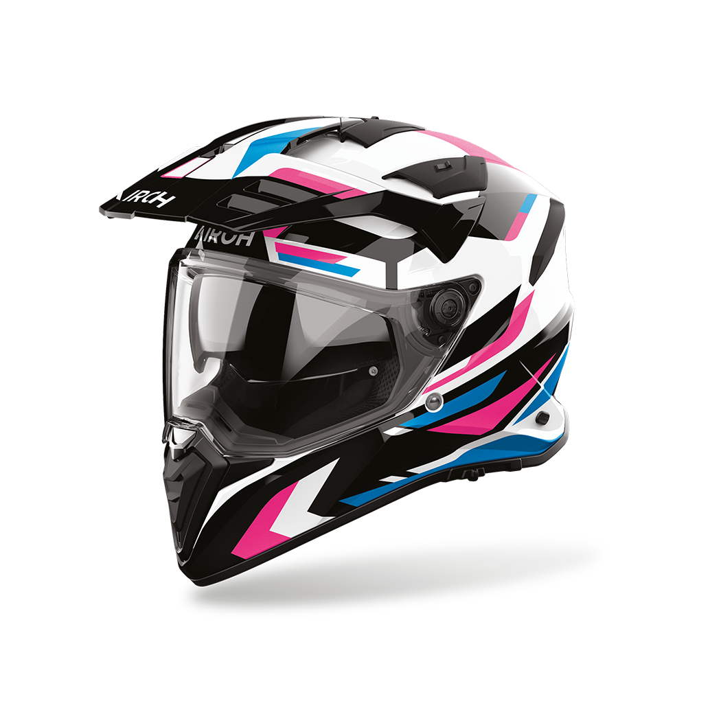 Airoh Bandit BADX-X Glitch Rosa Lucido (BATG54), casco adventure visto di tre quarti dal lato sinistro, grafica bianca e nera con inserti rosa e azzurri, lucida