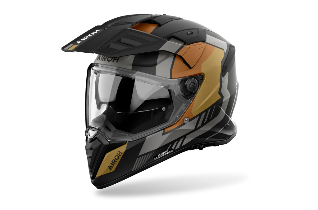 Airoh Bandit BADX-X Horn Oro Opaco (BAH35), casco adventure visto di tre quarti dal lato sinistro, grafica nera e grigia con inserti oro, opaca