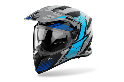 Airoh Bandit BADX-X Spicy Blu Lucido (BAS18), casco adventure visto di tre quarti dal lato sinistro, grafica grigia e nera con inserti azzurri e blu, lucida