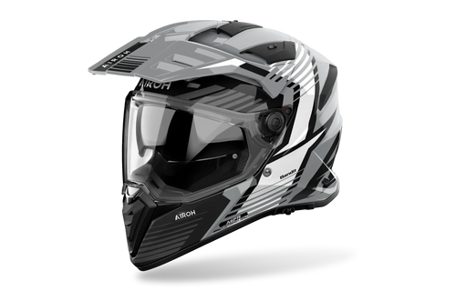 Airoh Bandit BADX-X Spicy Grigio Lucido (BAS16), casco adventure visto di tre quarti dal lato sinistro, grafica grigia, bianca e nera, lucida