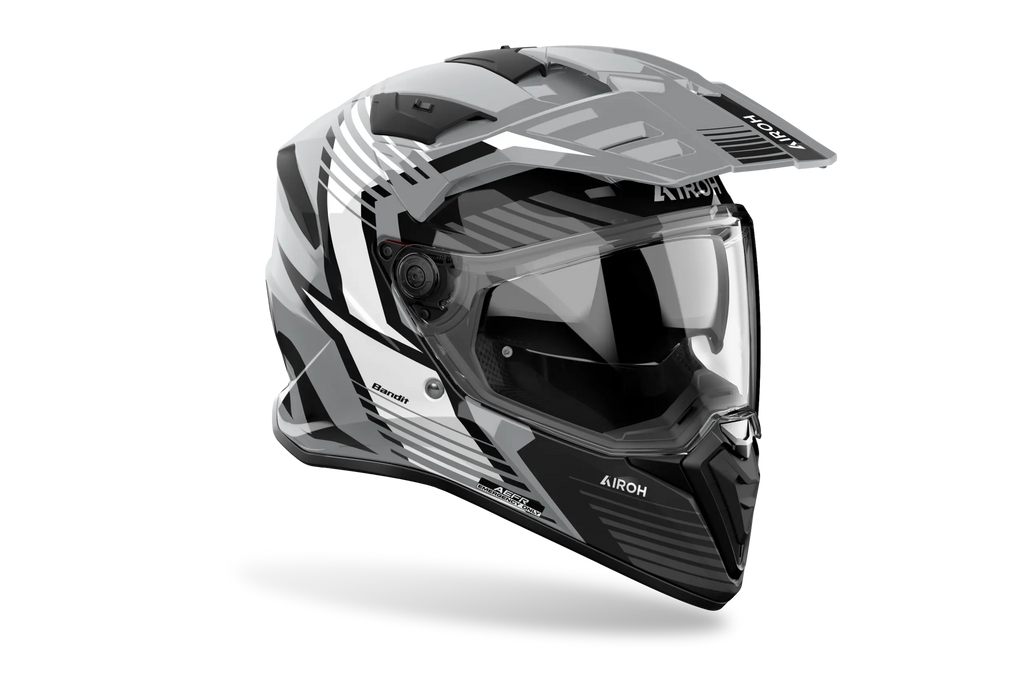 Airoh Bandit BADX-X Spicy Grigio Lucido visto di tre quarti dal lato destro, con frontino e visiera