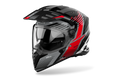 Airoh Bandit BADX-X Spicy Rosso Lucido (BAS55), casco adventure visto di tre quarti dal lato sinistro, grafica nera e grigia con inserti rossi, lucida