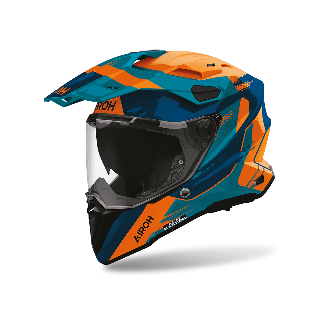 Airoh Commander 2 Razor Petrolio/Arancio Lucido (CM2RZ35), casco adventure visto di tre quarti dal lato sinistro, grafica blu petrolio e arancio, lucida
