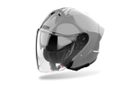 Casco jet Airoh H 21 grigio cemento lucido visto di tre quarti dal lato opposto