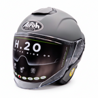 Casco Airoh H.20 grigio opaco di tre quarti con adesivo H.20 ancora sulla visiera