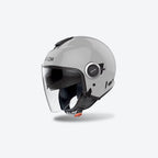 Casco jet Airoh Helyos Color grigio cemento lucido, vista tre quarti anteriore sinistra