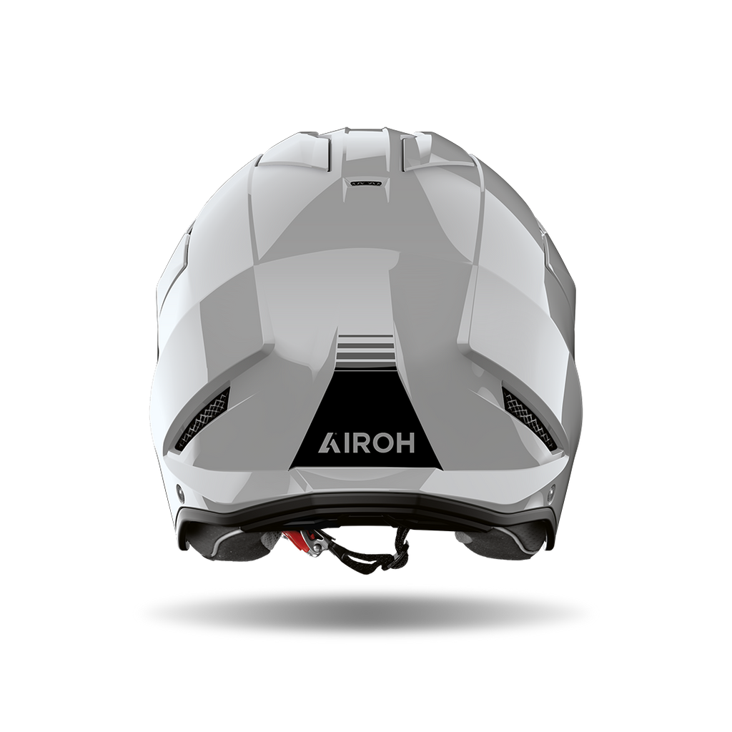 Airoh Kombakt grigio cemento lucido visto da dietro, con logo Airoh sulla calotta
