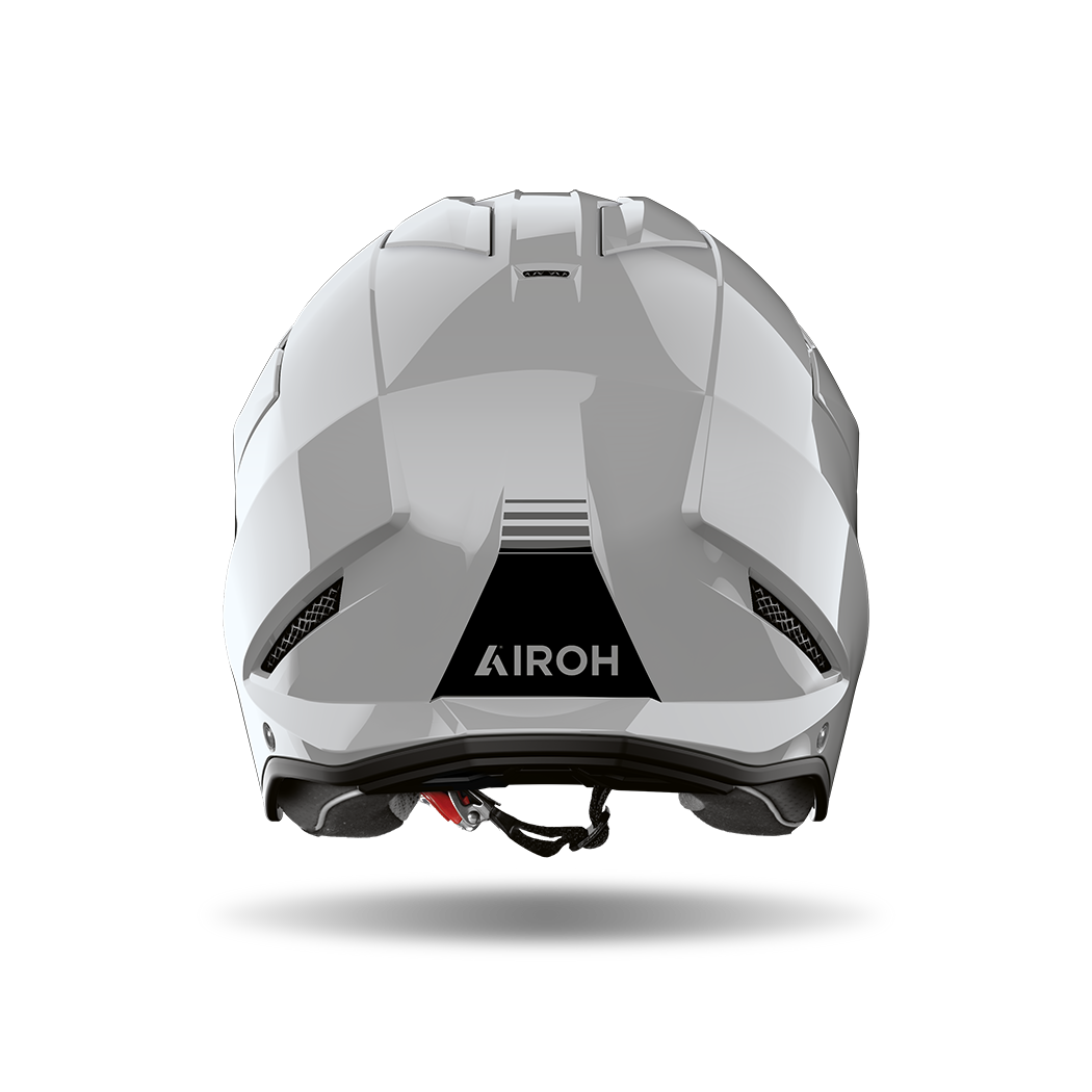 Airoh Kombakt grigio cemento lucido visto da dietro, con logo Airoh sulla calotta