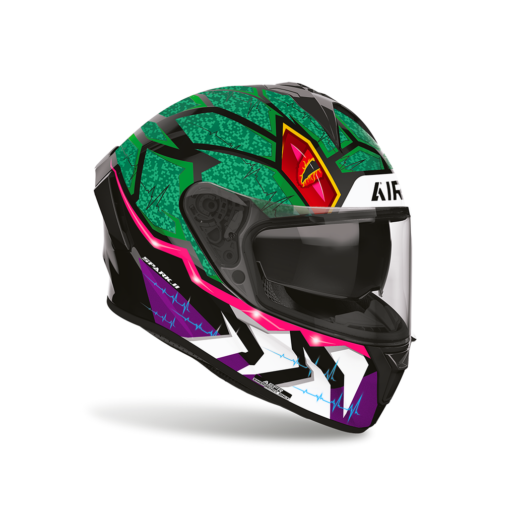 Airoh Spark 2 Rex Lucido visto di tre quarti dal lato opposto, grafica verde, viola e fucsia e visiera chiusa