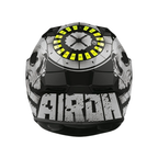 Airoh Valor Akuna nero lucido visto dal retro, con scritta Airoh grigia, teschi sui fianchi e anello giallo fluo sulla presa d'aria superiore