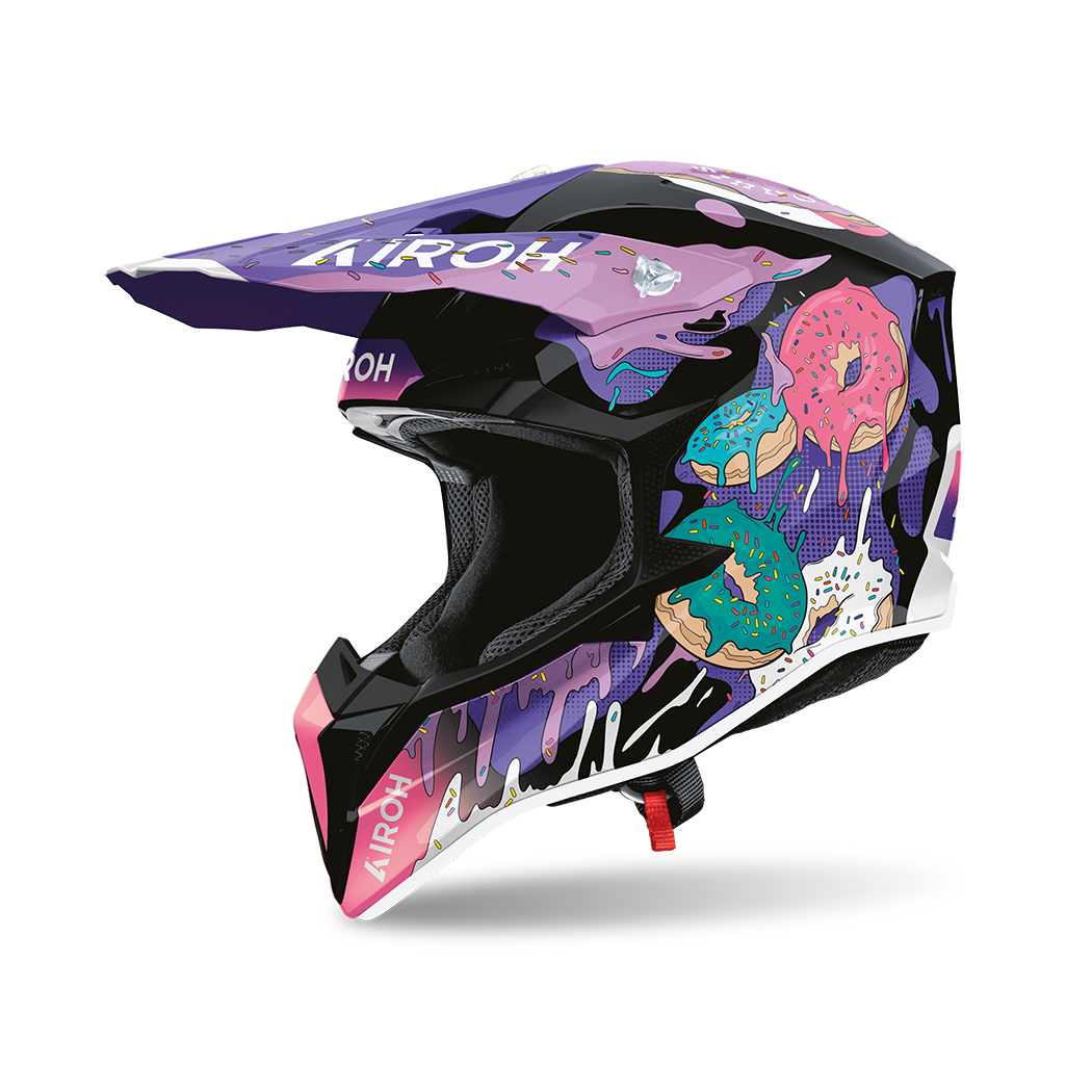 Airoh Wraaap Donuts Nero/Viola Lucido (WRAD17), casco cross visto dal lato sinistro con frontino, nero lucido con grafica viola e ciambelle rosa e azzurre