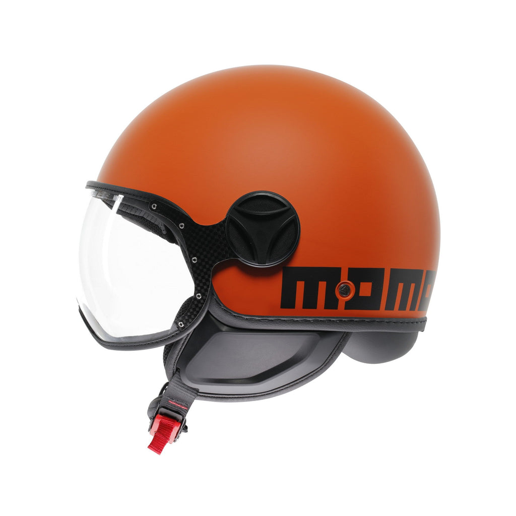Casco jet Momo Design FGTR Classic Mono arancione opaco, lato sinistro con scritta MOMO nera e nottolino nero