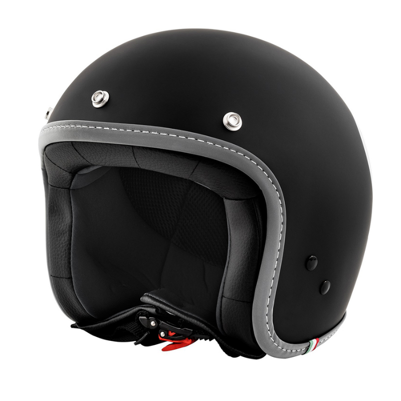 Casco jet Vespa Colors nero opaco con bordo riflettente e bandierina tricolore, vista tre quarti