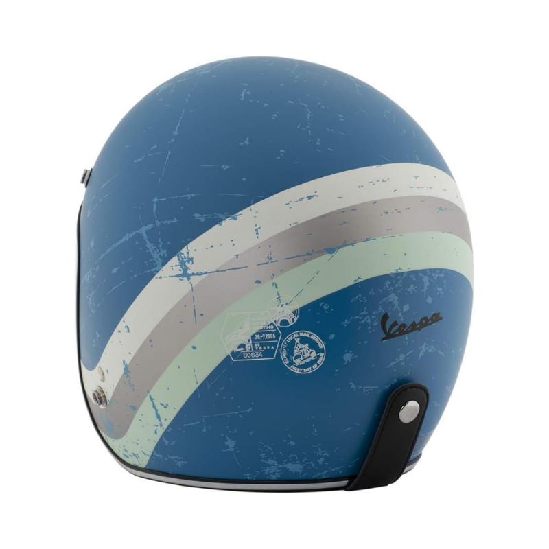 Retro del casco jet Vespa Heritage azzurro con grafiche vintage stile francobollo e logo Vespa